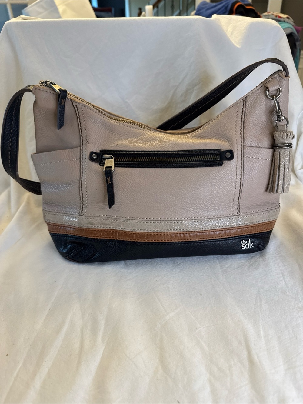 The Sak Pebble Leather Two-Tone Shoulder Bag with Tassel